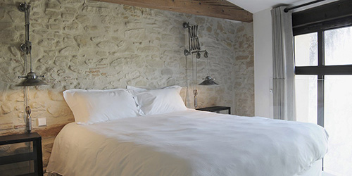 Suite-Presbytere-Hostellerie-du-Chateau-de-la-Pomarede-4-etoiles_1200.600.ratio-S.photo.jpg